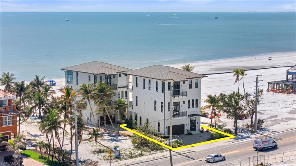 Image 4: Water view with local beach Virtually Enhanced