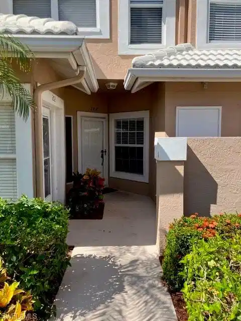 Image 1: Storage closet to the right of front door