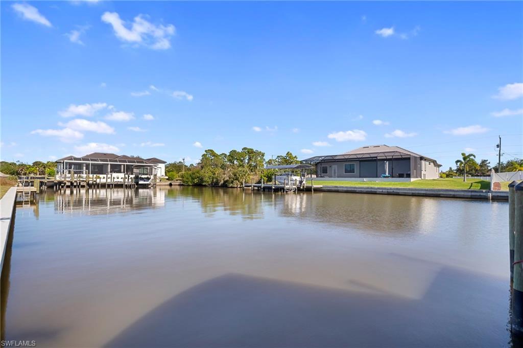 Image 2: Water view featuring a dock