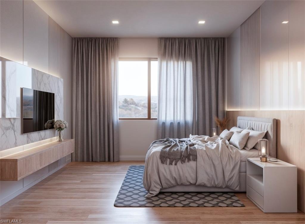 Image 4: Bedroom featuring light wood-style flooring and recessed lighting (Rendered photo)