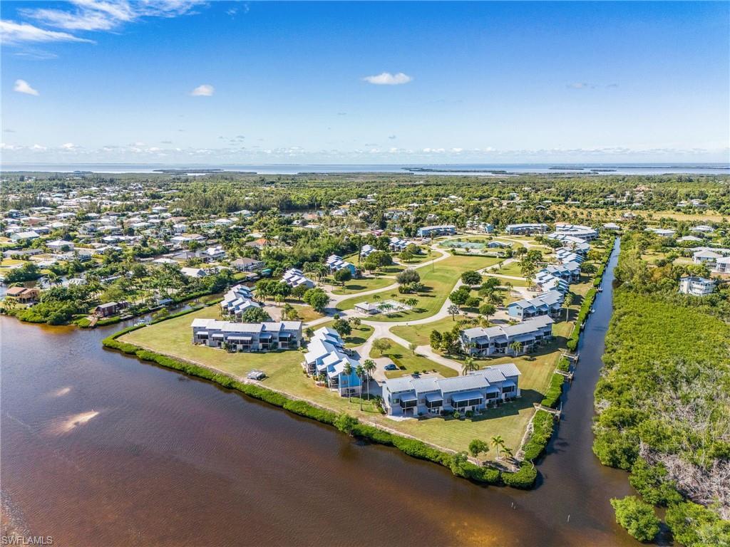 Image 3: Aerial view of residential area with ample greenspace (25 acres)!