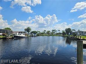 Image 1: Water view with a dock