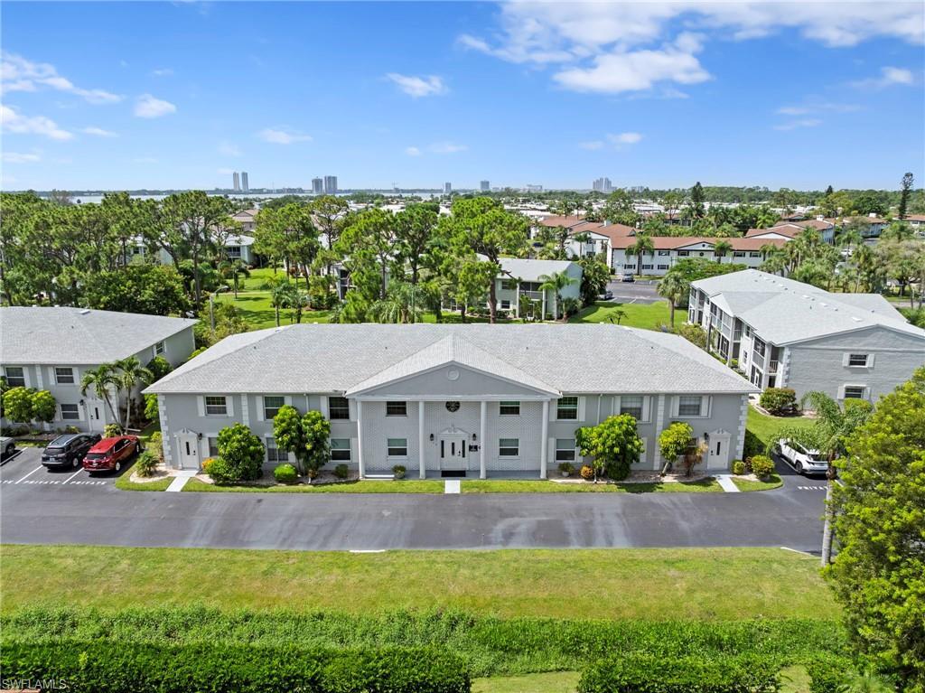 Image 1: Aerial View of Condo Building