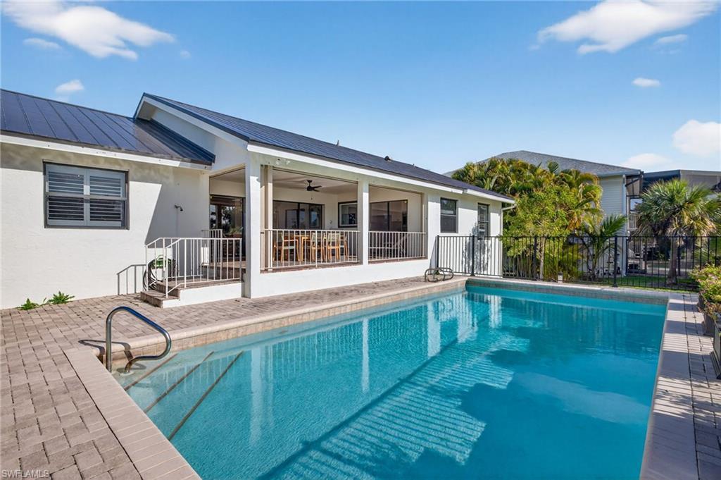 Image 3: View of pool featuring patio surround