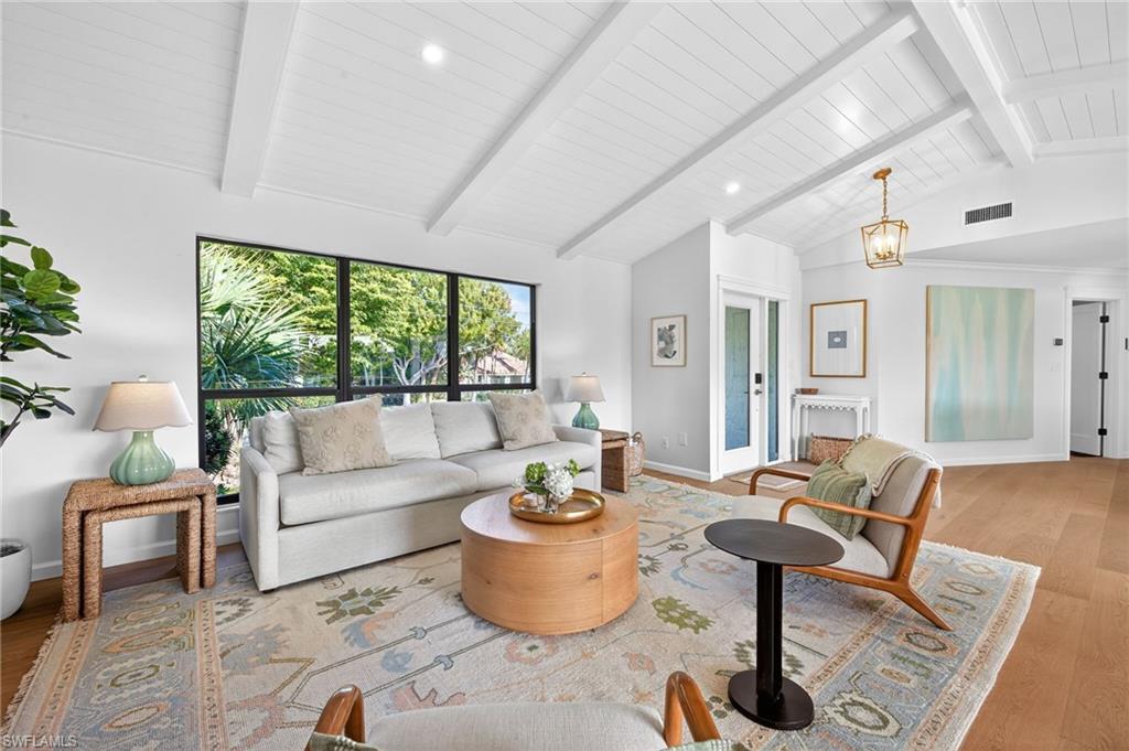 Image 4: Living room featuring light wood-type flooring and recessed lighting