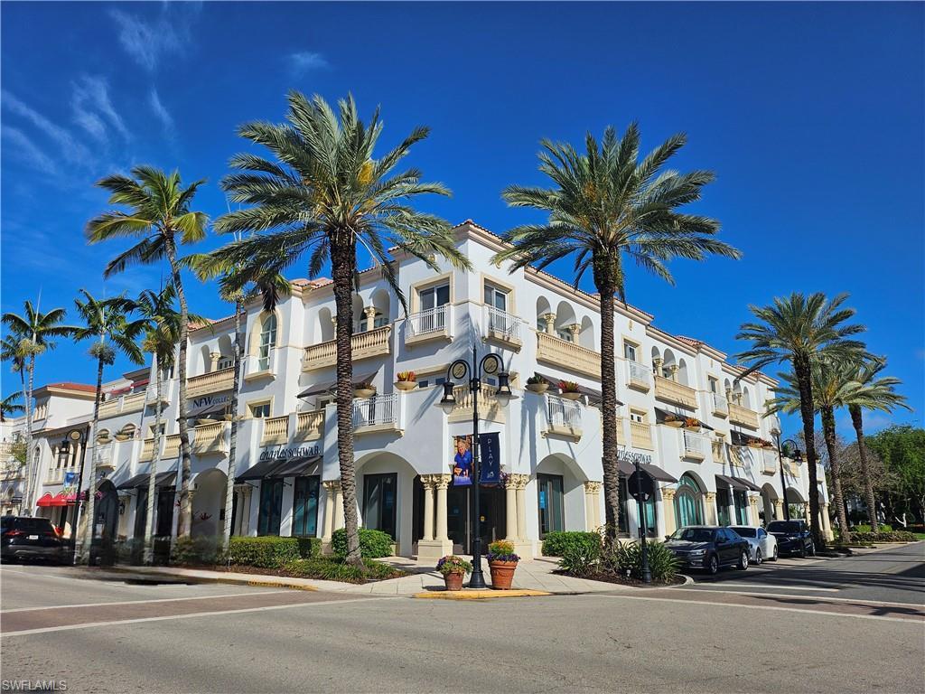 Image 1: Beautiful building with shops below