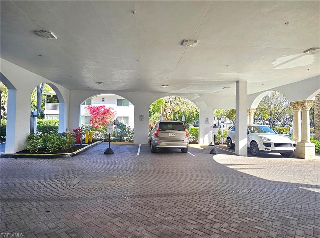 Image 3: attached covered parking second car in the valet lot, reserved