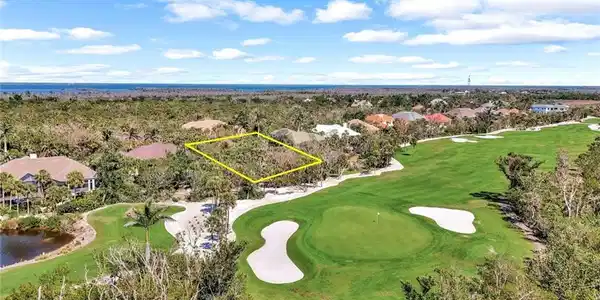 Image 3: Drone / aerial view with view of golf course and a water view