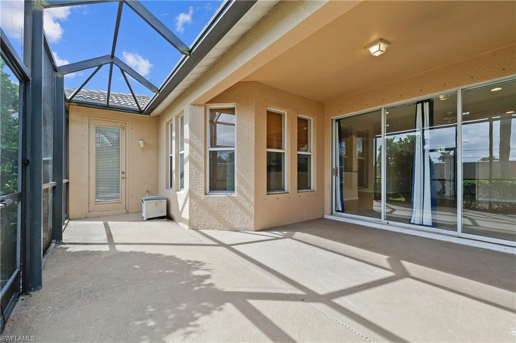 Image 3: Enjoy Dinners or Morning Coffee in the screened Lanai