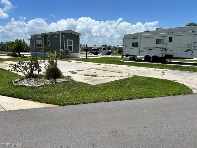 Image 4: left side of the lot