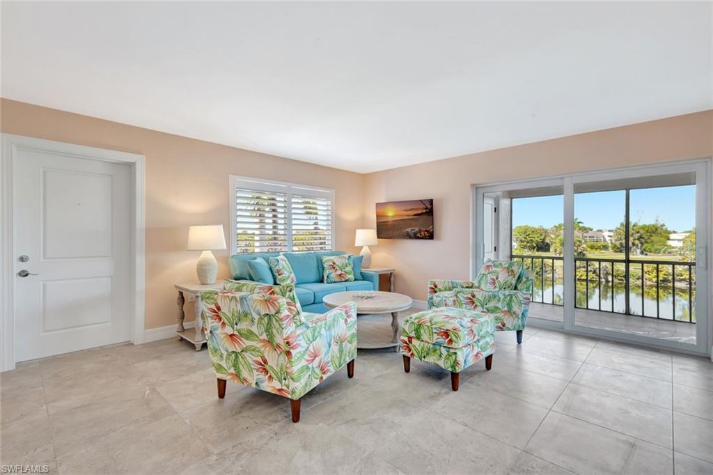 Image 4: Living area featuring baseboards