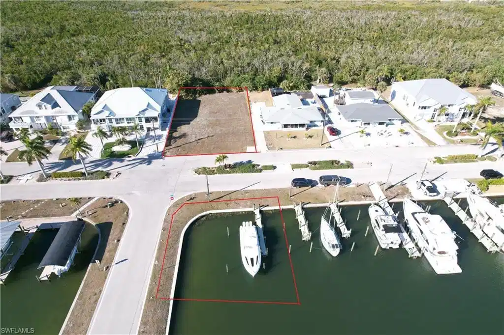 Image 1: Aerial view boundary lines lot and boat slips