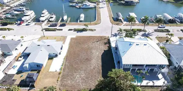 Image 2: Aerial view lot and boat slips