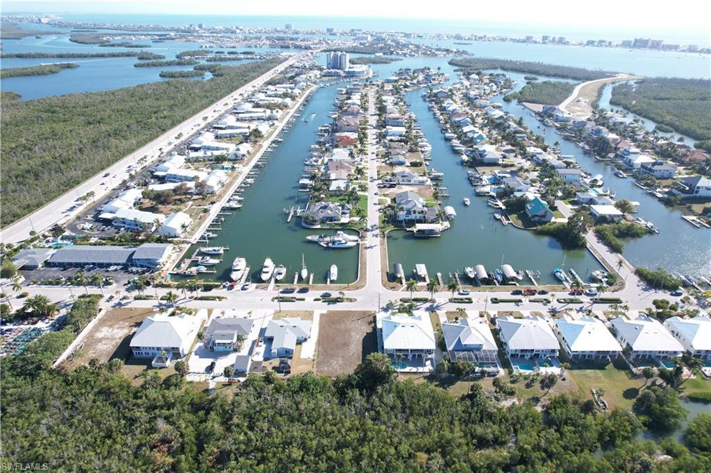 Image 3: Aerial view lot and boat slips-Siesta Isles