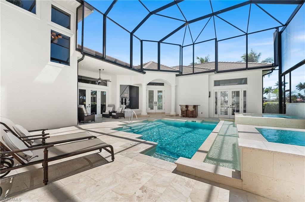 Image 2: Amazing courtyard style home has a rebuilt saltwater pool/spa, hot/cold plunge pool.