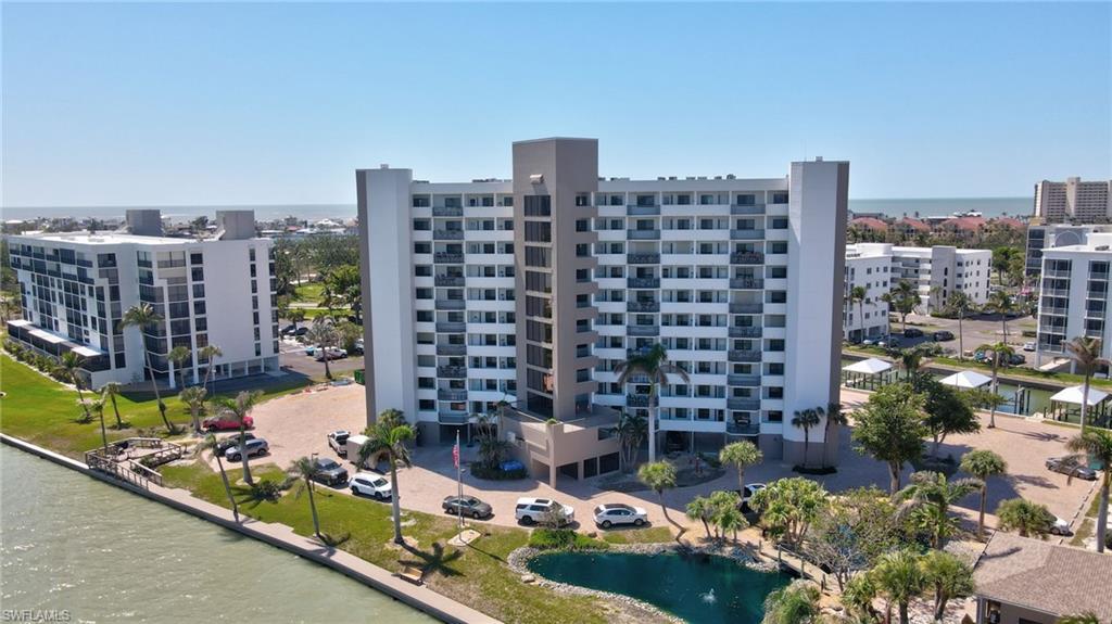Image 1: View of property with a water view