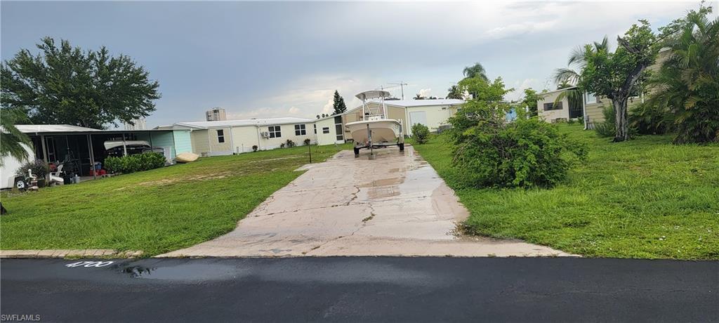 Image 4: Vacant Lot & driveway