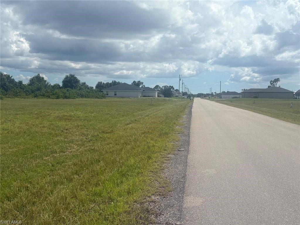 Image 1: View of asphalt street