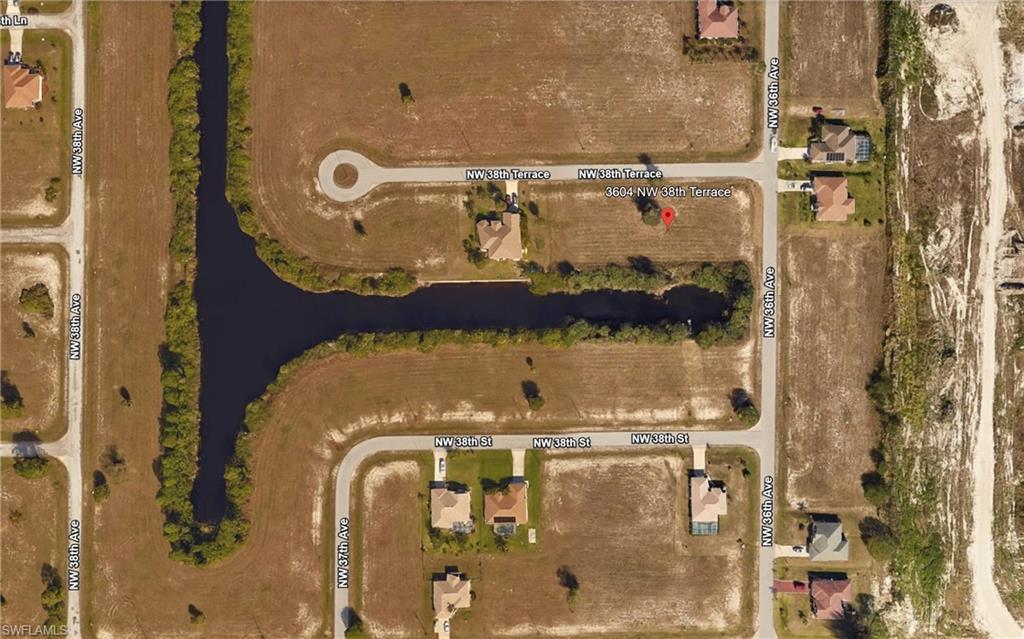 Image 1: Bird's eye view of a nearby body of water