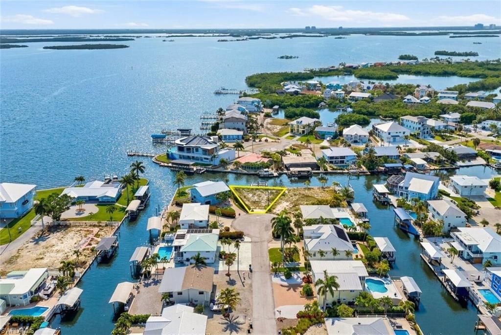 Image 3: Waterfront residential lot with direct canal access - Virtually Edited Image