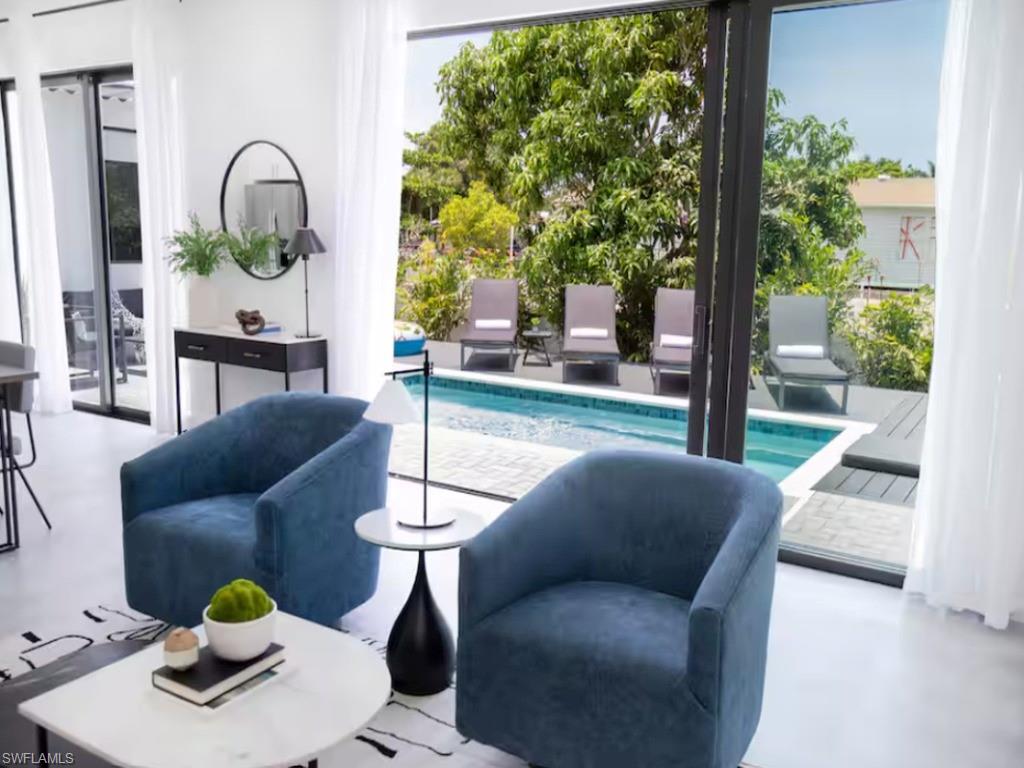 Image 4: Pool view from the living room