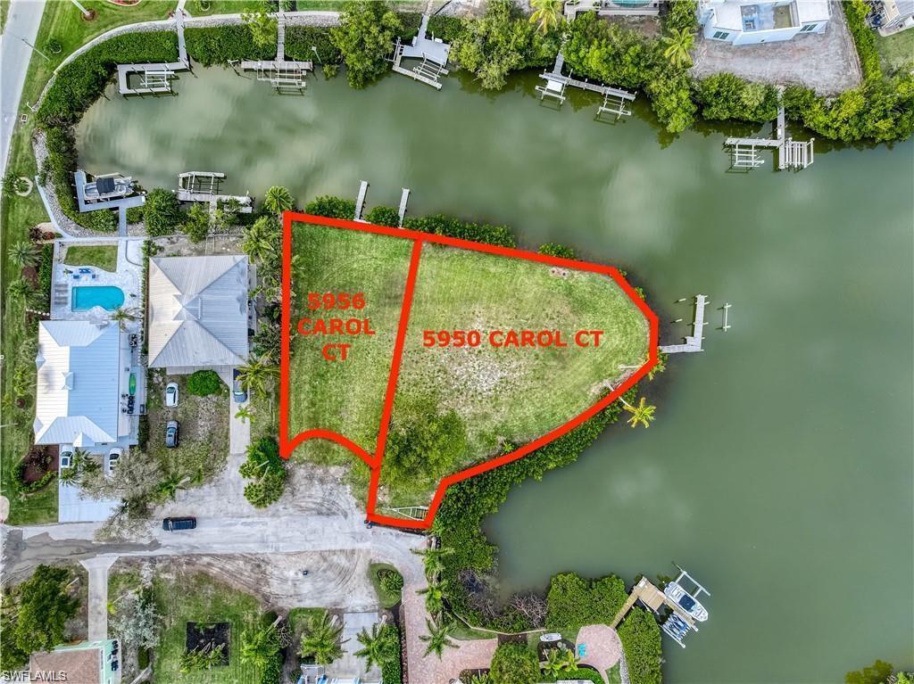 Image 3: View of property location with property parcel outlined and a large body of water