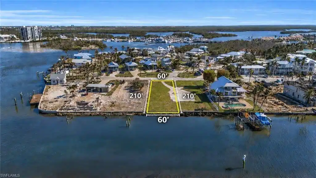 Image 1: Waterfront parcel featuring 60' of water frontage and 210' of depth- Virtually Edited Image
