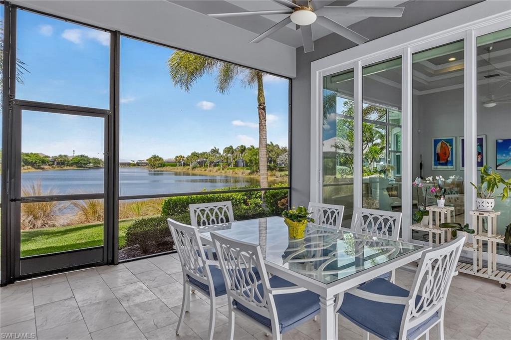 Image 4: Covered lakeside lanai designed for dining, relaxing, and sunset views.