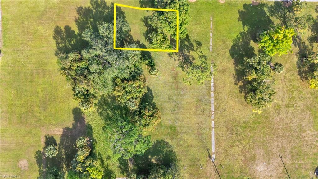 Image 4: Aerial overview of property's location featuring property parcel outlined