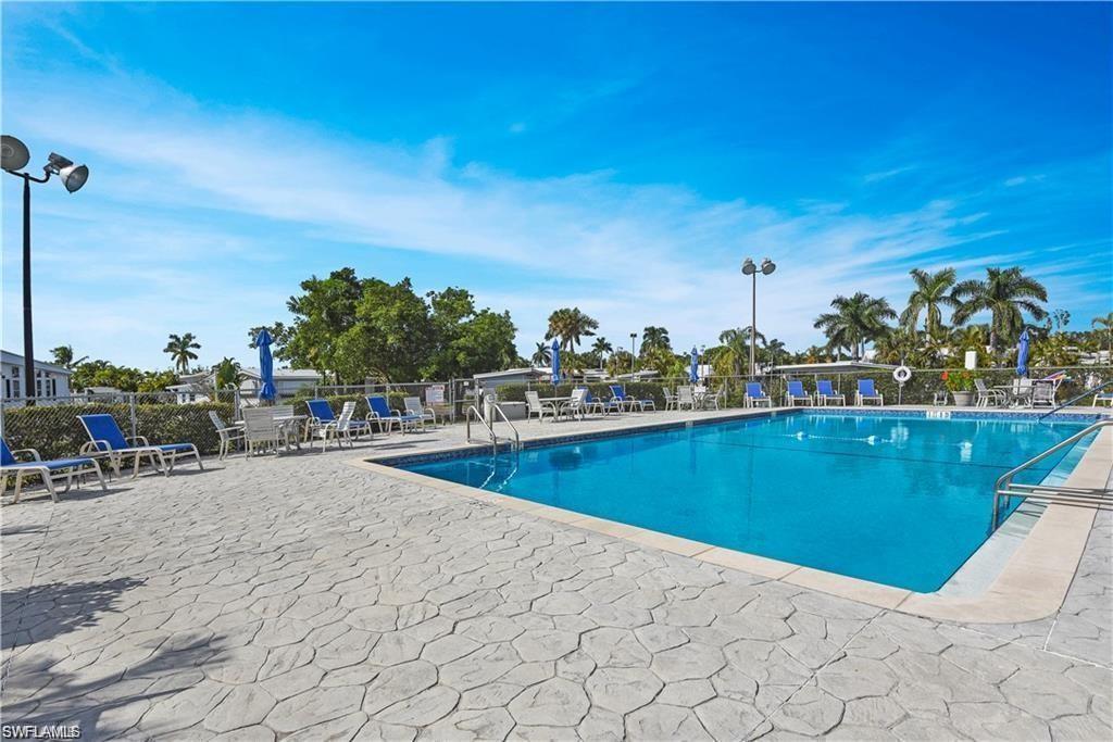 Image 4: View of pool featuring a patio