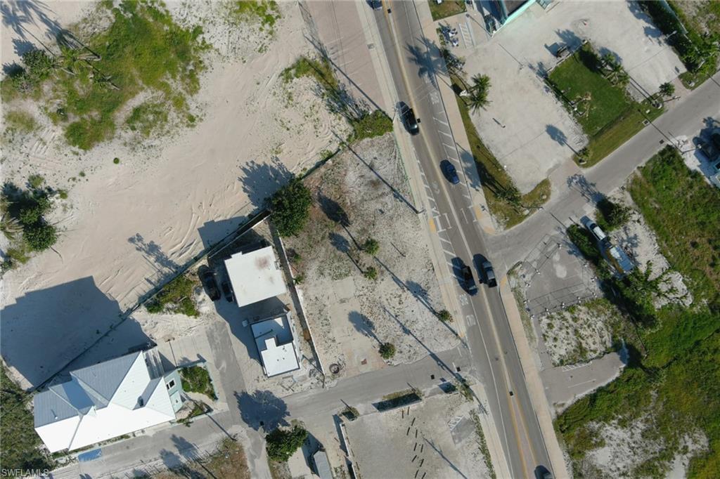 Image 2: Aerial view of property and surrounding area
