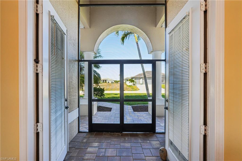 Image 3: Entryway featuring a textured wall