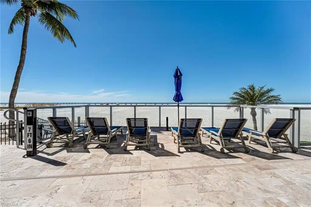 Image 1: View from the glass front terrace with view of beach