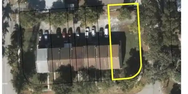 Image 3: Aerial overview of property's location featuring property boundaries highlighted