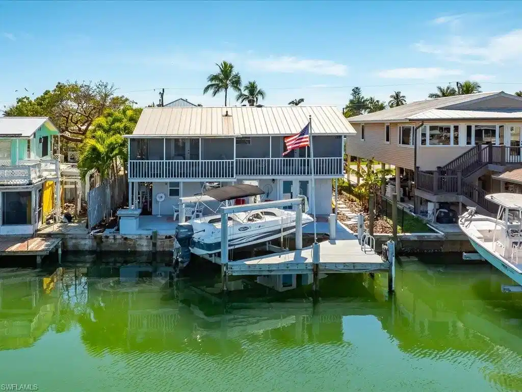 Image 1: Dock area with a water view