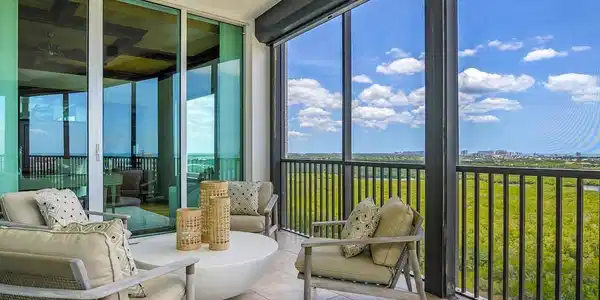 Image 3: Accessible from Living room and den - enjoy serene sunset and views.