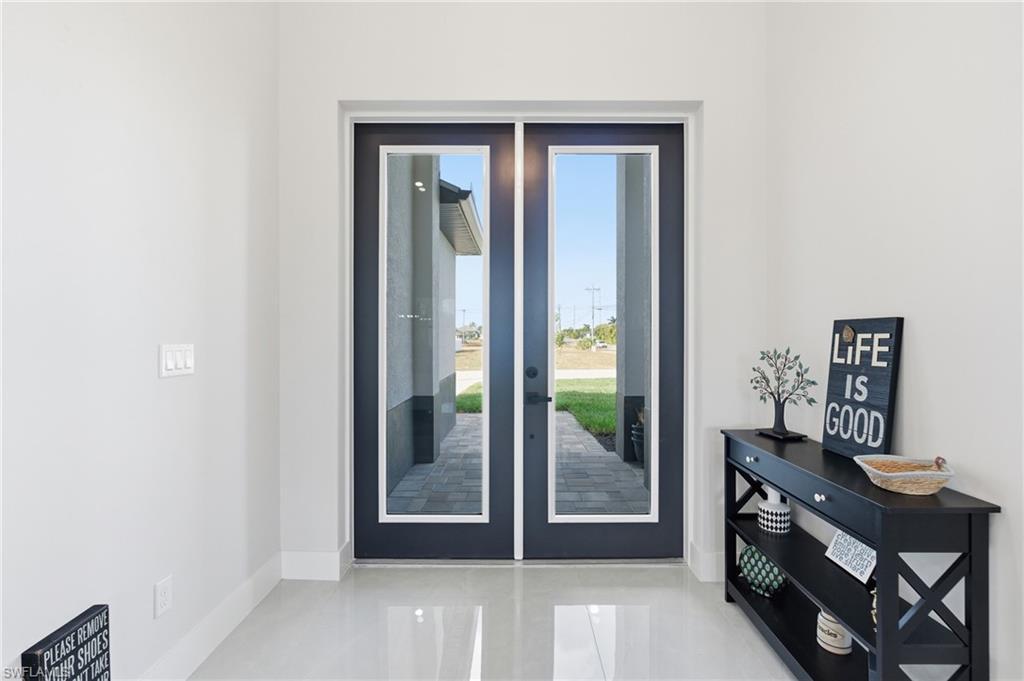 Image 2: Entryway featuring french doors