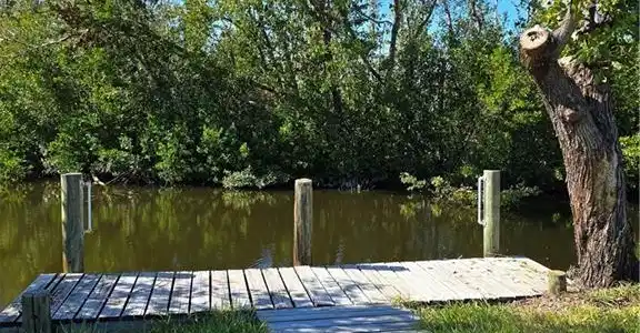 Image 3: Dock area featuring a water view