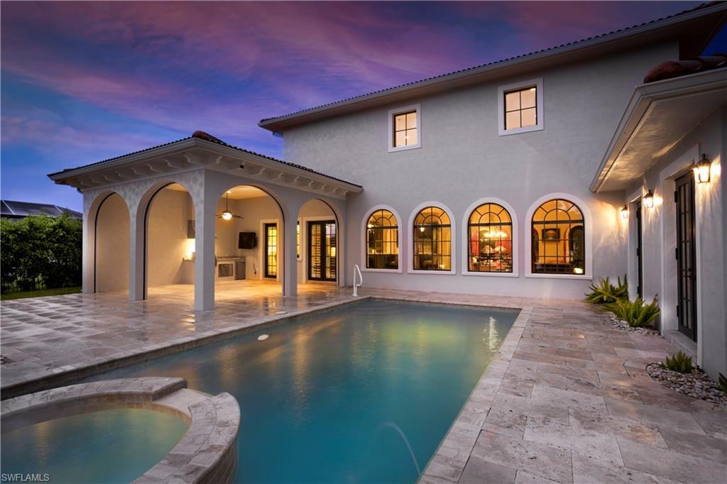Image 2: Private Lanai with impact screened cabana, outdoor kitchen,travertine deck and custom pool/spa