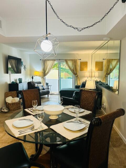 Image 2: Dining and Living area