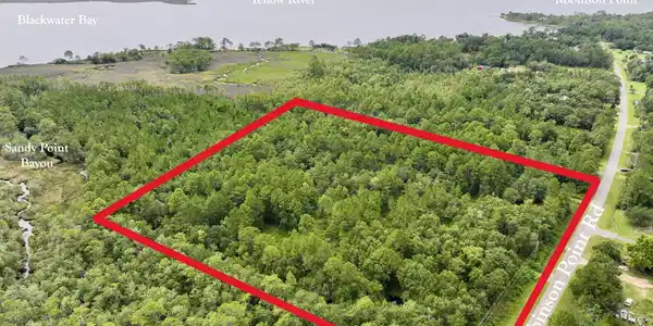 Image 2: Side of Property