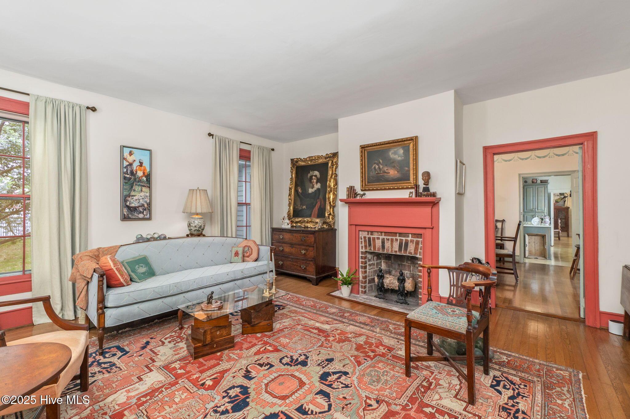 Image 4: Formal living room w/ fireplace