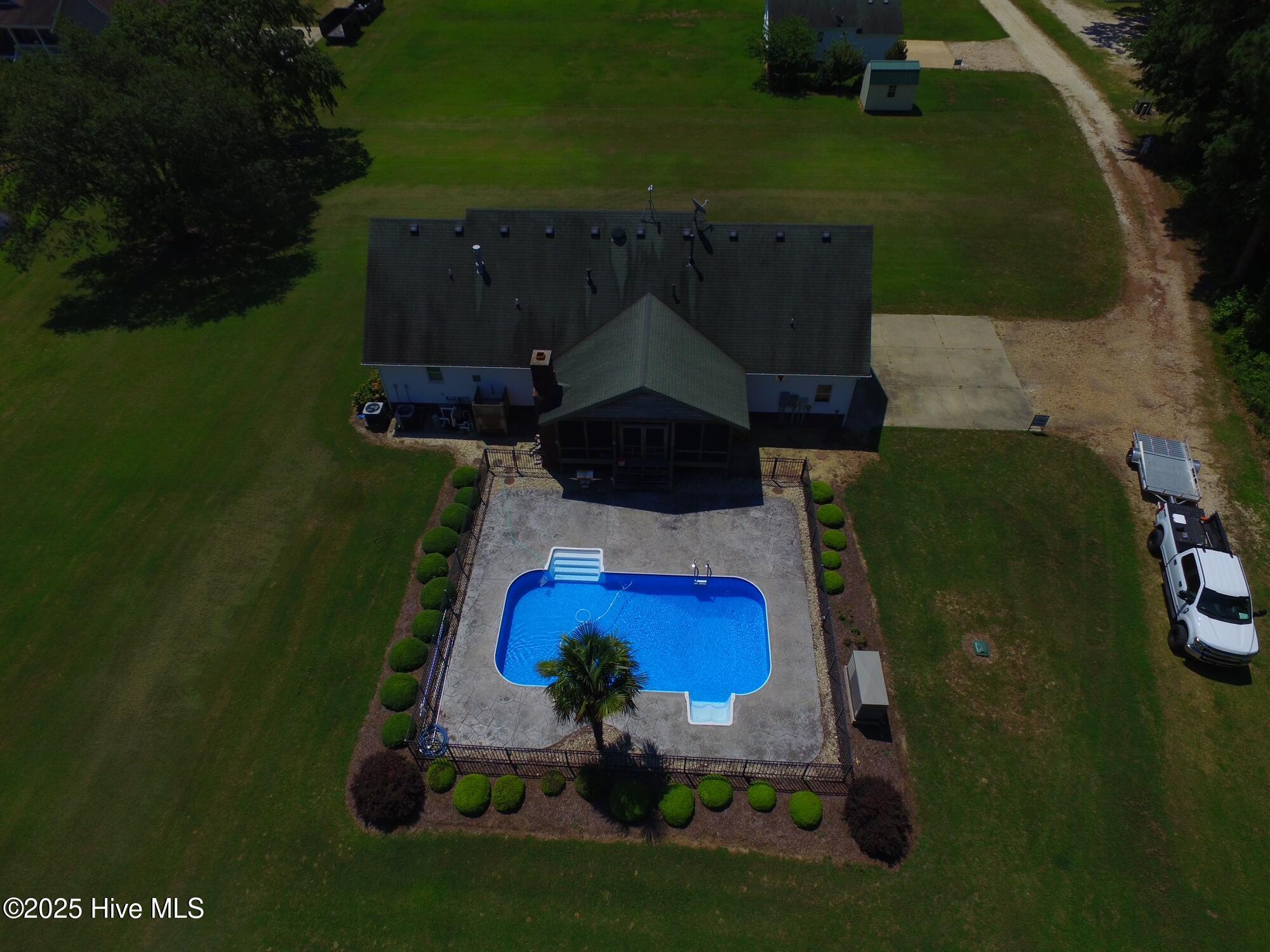 Image 3: 104 Perry's Way drone shot of main house