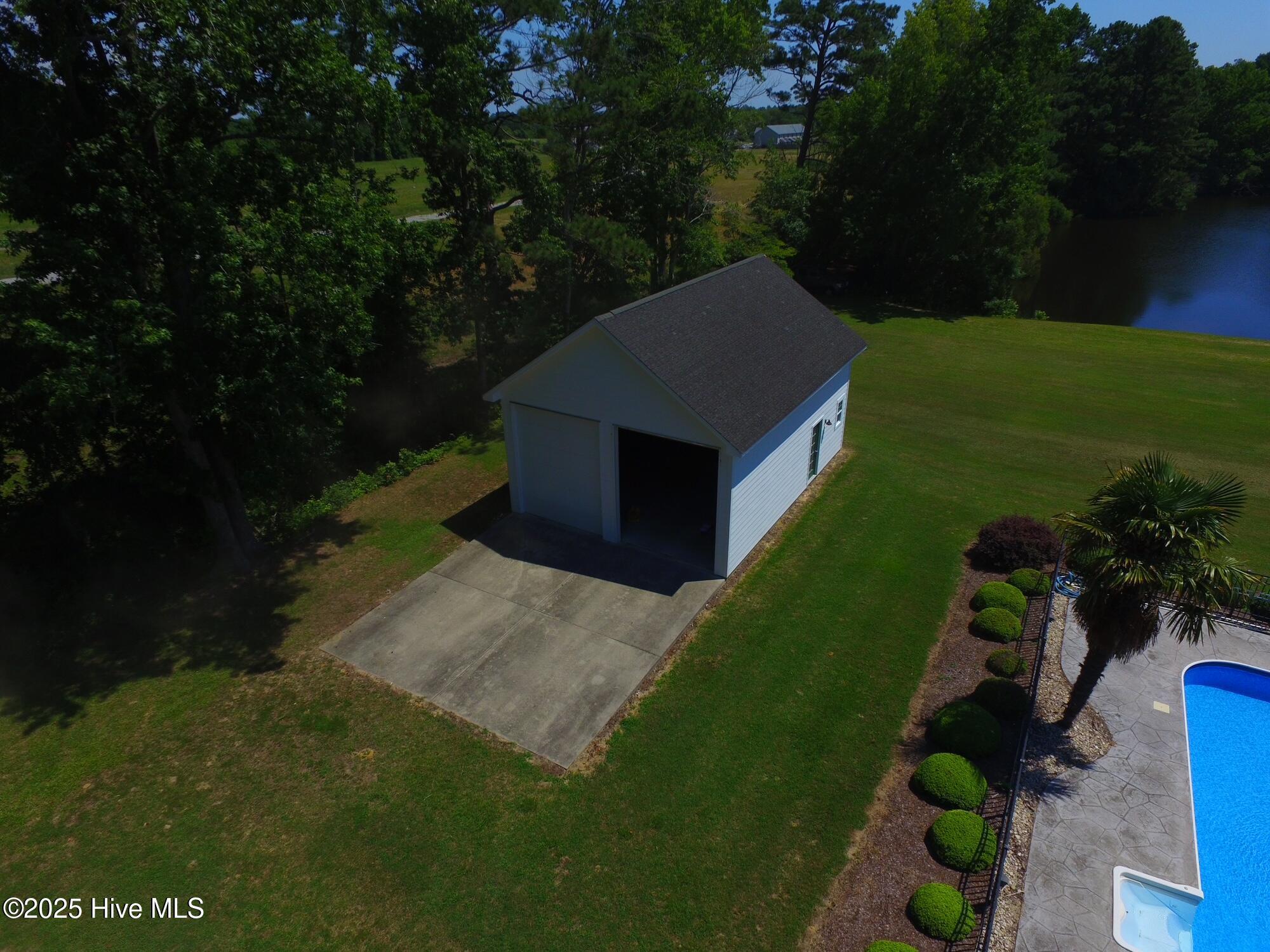 Image 4: 104 Perry's Way drone shot of detached 2