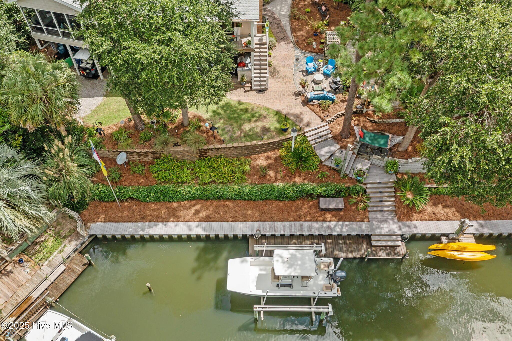 Image 1: Canal Front Home