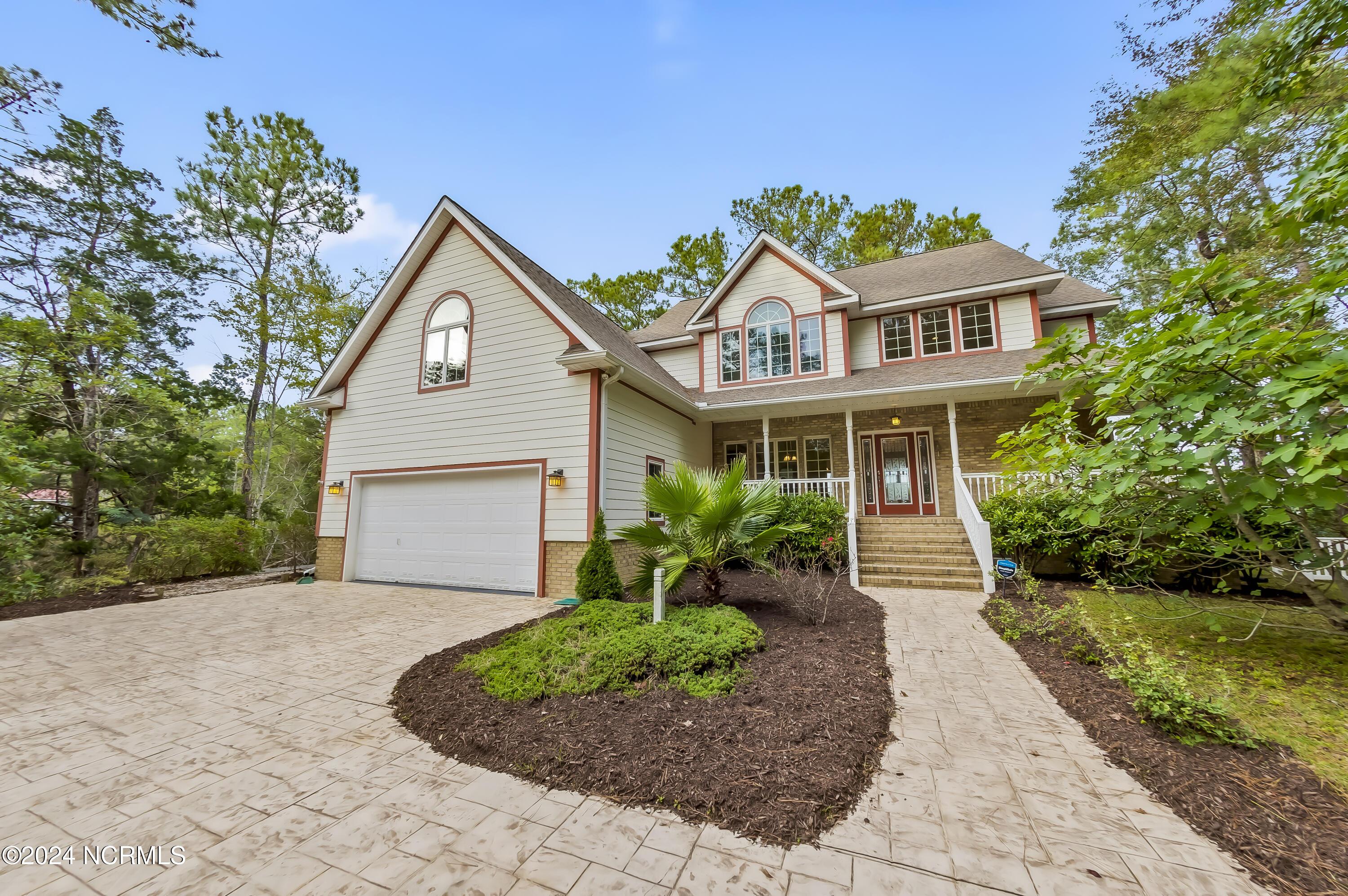 Image 1: Front view of house