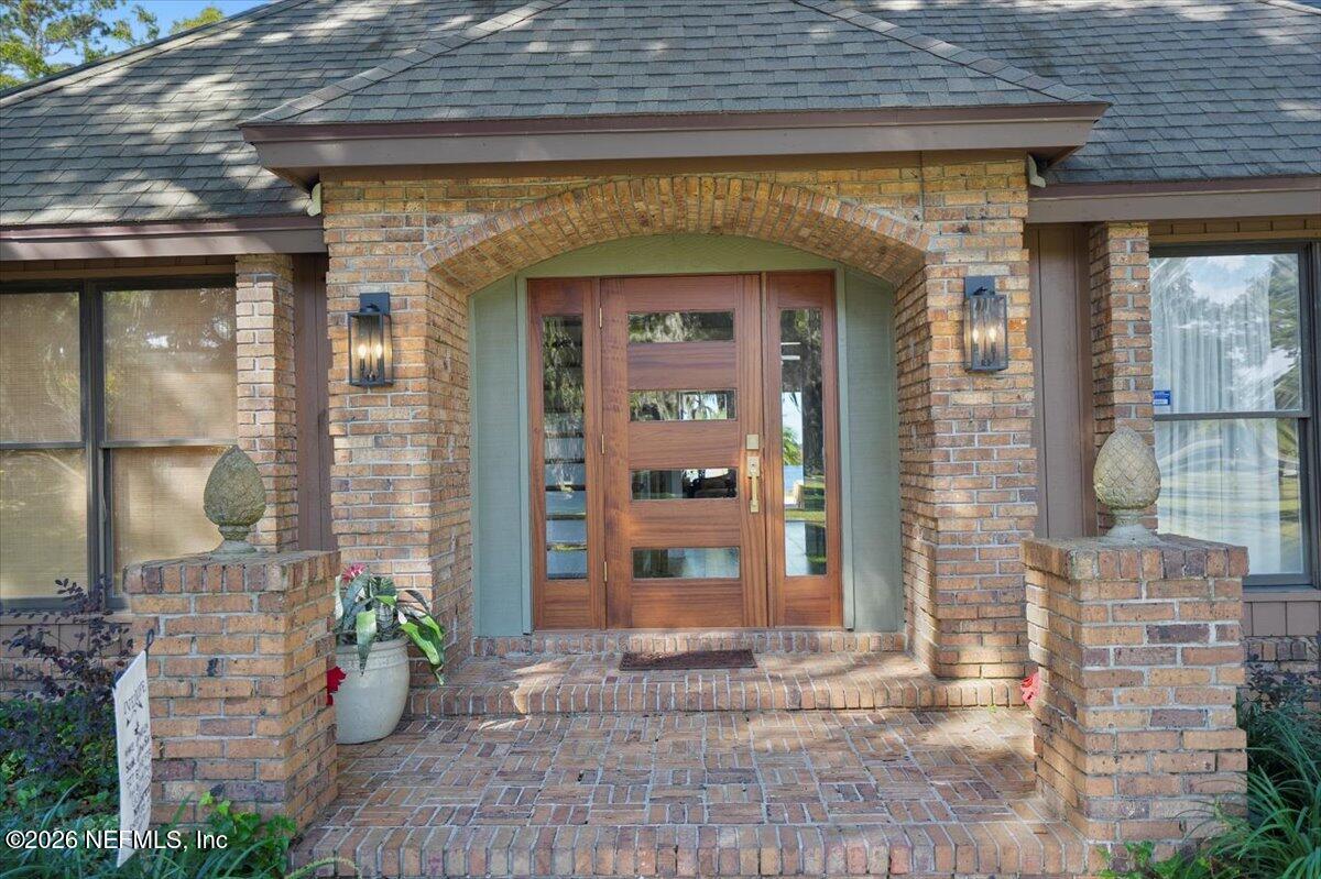 Image 3: Entrance with Custom Mahogany Door