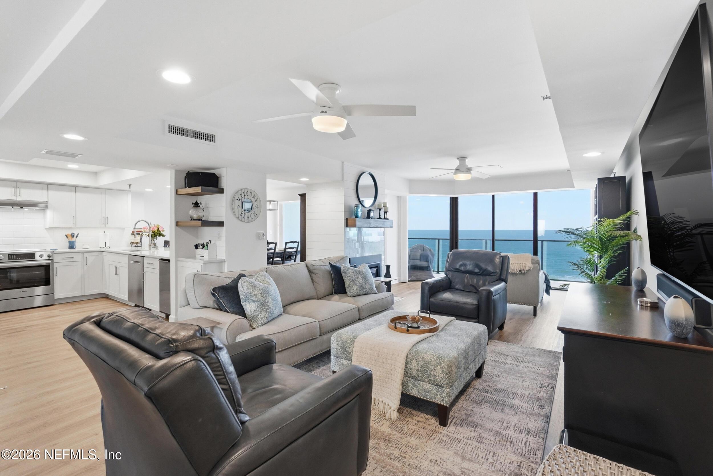 Image 1: living room ocean views