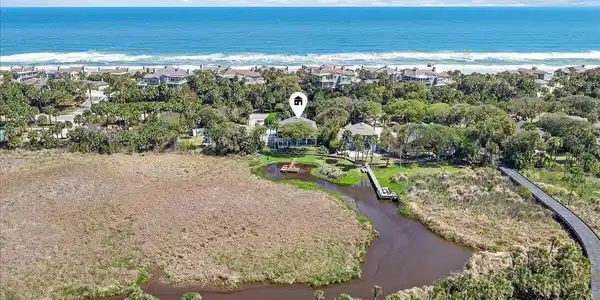 Image 2: Aerial East to Ocean and Rear of Home