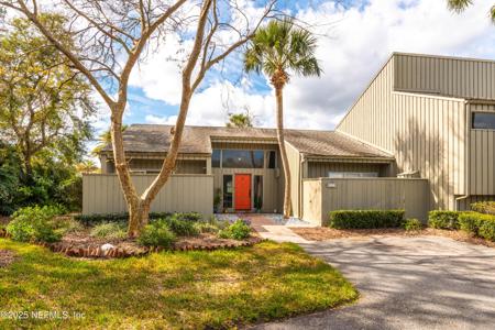 9996 SAWGRASS Drive E